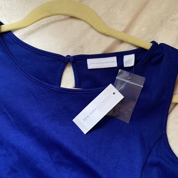 Pockets!! Mid length tank style dress with pockets. - Picture 2 of 4